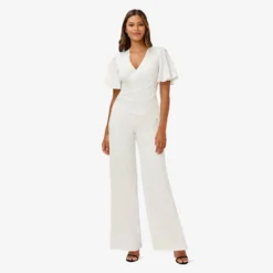 Adrianna Papell Satin Crepe Faux Wrap Jumpsuit With Flutter Sleeves In Ivory