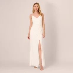 Adrianna Papell Draped Matte Jersey Gown With Deep Slit And Spaghetti Straps In Ivory